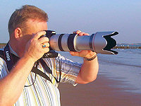 Fotograaf aan zee